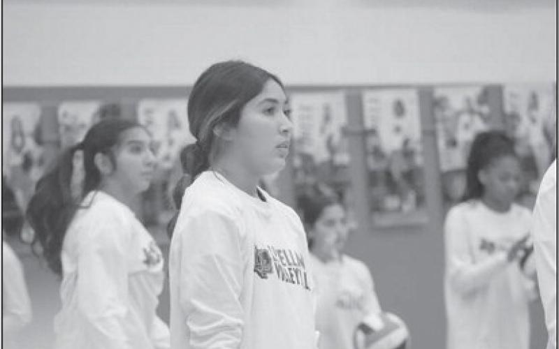 PRE-GAME - Levelland Loboette Gabby Pesqueda was warming up with her teammates before the game. The Loboettes won the game 3-1 thank to their team effort. (Staff photo by Aalijah Soliz)