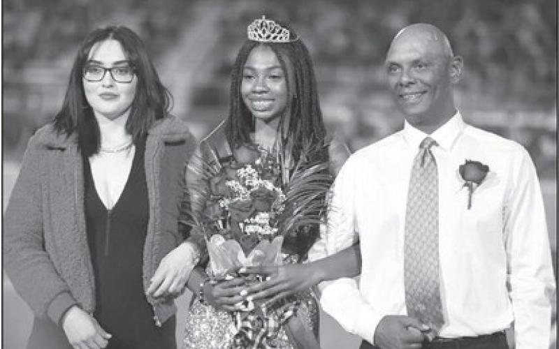 2023 HOMECOMING - Tanaesia Brackens was crowned 2023 Homecoming Queen by 2022 Queen Laci White last Friday at Levelland’s game last Friday. (Staff photo by Dom Puente)