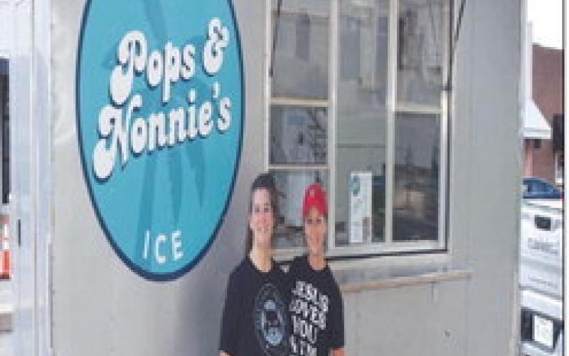 POPS &amp;amp; NONNIE’S – Pictured are LaNita Avery and LaTryle Sehon with their shaved ice truck on Thursday. The pair came to the square for this month’s Food Truck Day. (Staff photo by Ada Niederhauser)