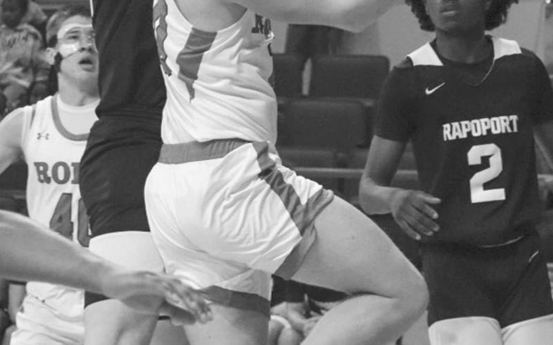TOUGH SHOT - Ropes Eagle Brady Bryan layed the ball up through the contact during the team’s game against Meyer this past Tuesday night at ACU. (Staff photo by Aalijah Soliz)