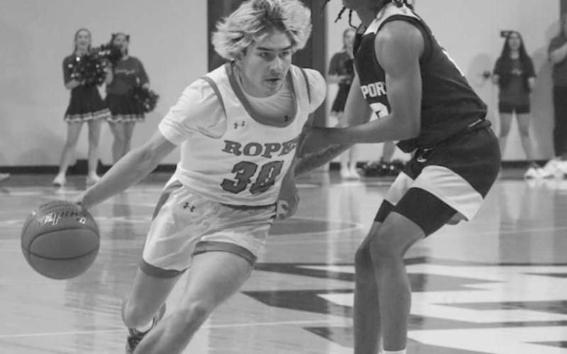 CAN’T STOP ME - Ropes Eagle Branson Simental drove past his defender during their full-court press this past Tuesday night in Abilene. (Staff photo by Aalijah Soliz)