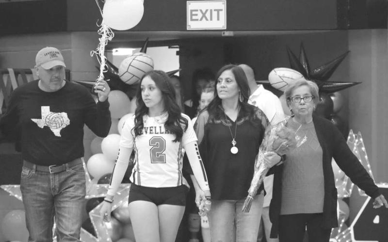 SENIOR NIGHT - Levelland Loboette Taylyn Ledesma was escorted on the court during Senior Night last Tuesday by her family Janice Robles, Max Ledesma and her grandparents, Vicky and Juaquin Robles. Taylyn plans on attending OSU and studying forensic science. (Staff photo by Aalijah Soliz)