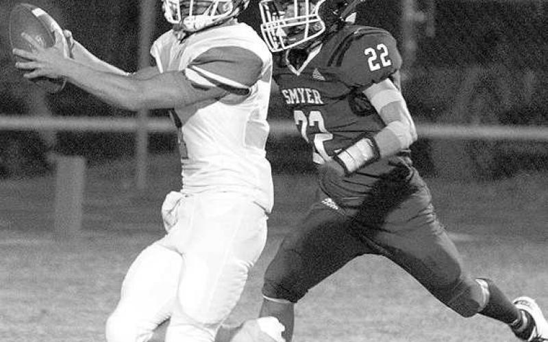 CATCH FOR SEVEN- Ben Saldivar made a TD catch in a win against Smyer on October 7. The Eagles defeated Morton last Friday and will continued their season on the road October, 21. (Photo Courtesy of Donovan Martin)