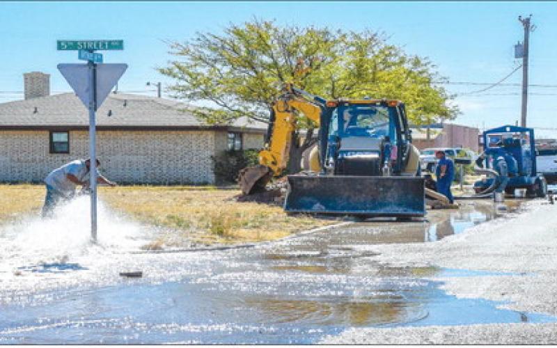 WATERLINE WORK - The City of Levelland public works crew were working to address a waterline issue along 5th Street and Avenue A on Wednesday afternoon. The crew worked throughout the remainder of the day to make repairs. (Staff photo by Evin Thomas)