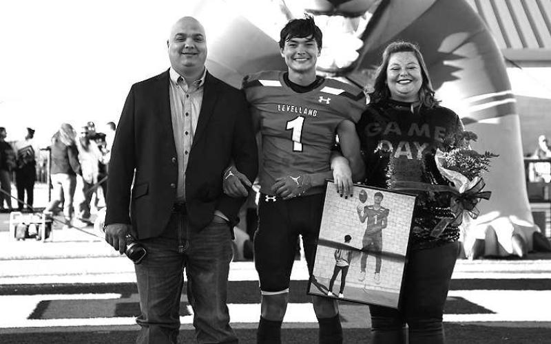 SENIORLOBO- Levelland seniors were recognized last Friday during the Lobos home win game against Borger. Lobo Zameron Lecroy was escorted by his parents Anthony and Angelica Lecroy. (Staff Photo by Dom Puente)
