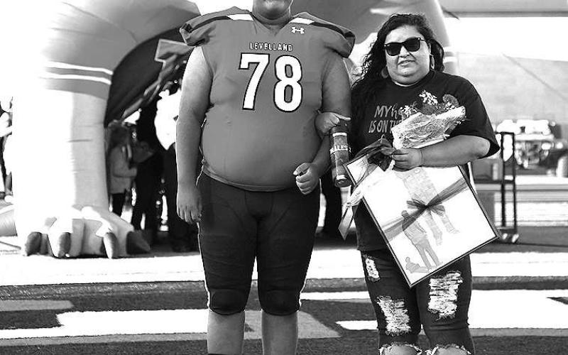 SENIOR LOBO- Levelland seniors were recognized last Friday during the Lobos home win game against Borger. Lobo Jeremiah Corrales was escorted by his mother Daniela Corrales. (Staff Photo by Dom Puente)