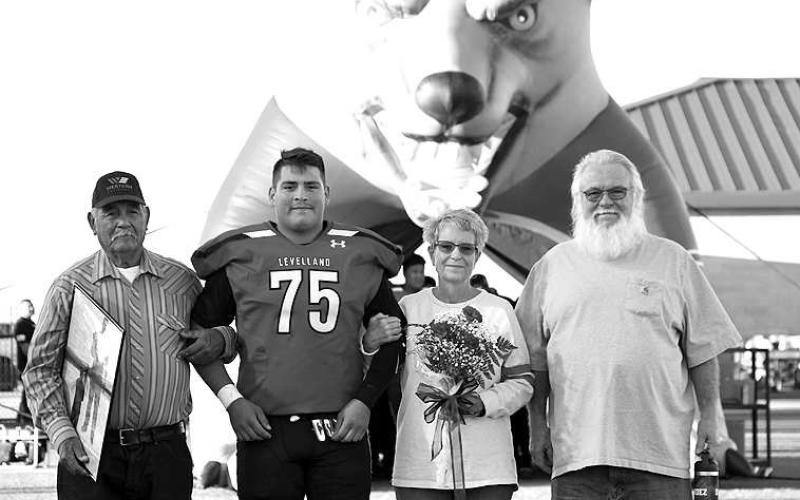 SENIORLOBO- Levelland seniors were recognized last Friday during the Lobos home win game against Borger. Lobo Dylan Hernandez was escorted by Patricio Hernandez and other family members. (Staff Photo by Dom Puente)