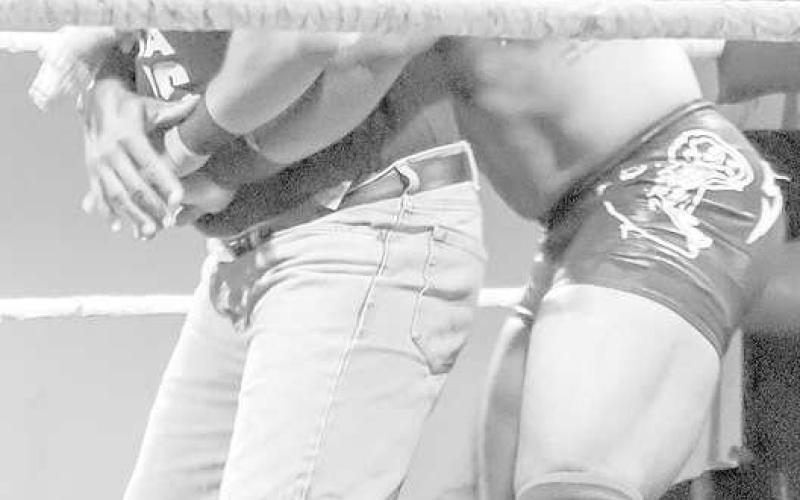 WRESTLING GRAPPLE - Lucha Dad was put in a tight grapple from TJ Slater at the wrestling event held at the TMW. (Staff Photo by Aalijah Soliz)