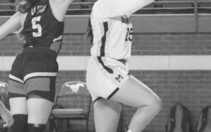 FLOATER - Morton Maiden Ruby Guttierrez shot the ball during the teams first game of the Denver City Tournament last weekend. (Staff photo by Aalijah Soliz)