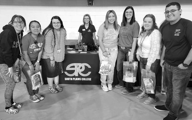 COLLEGE FAIR– South Plains College hosted its annual College Fair recently with 30 Colleges, Universities and Technical Schools represented for area high school seniors. Levelland High School seniors Sam Young, Elyanna Solano, Maci Coleman, Sierra Arrendondo, Abigail Cirilo, Bree Montgomery and Gabriel Garza visited with SPC Admissions Counselor Abbey Whatley about their plans for the future. (Submitted Photo)