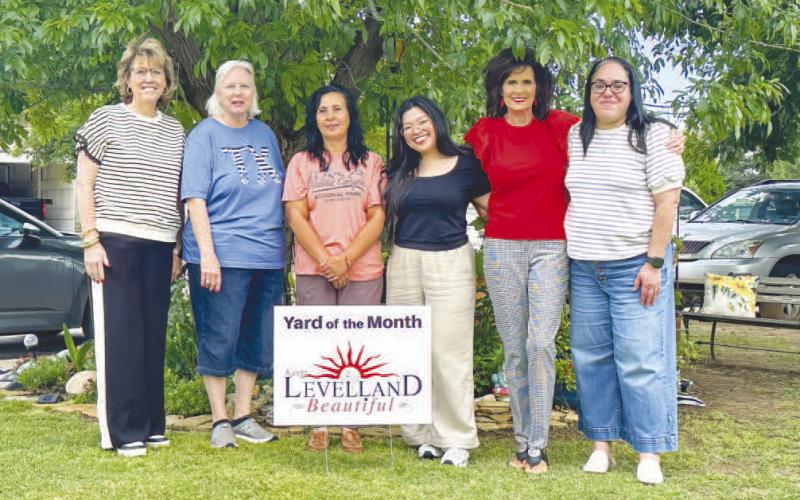 YARD OF THE MONTH – Adriana Nieland received the Yard of the Month award for June courtesy of the Levelland Chamber of Commerce and Keep Levelland Beautiful. Pictured from left to right are: Mary Siders, Donna Wheeler, Adriana Nieland, Arra Delos Santos, Cristal Isaacks and Janie Mireles. (Staff photo by Hannah Woodrum)