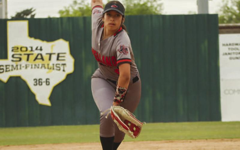 ON ITS WAY - Levelland Loboette Aubree Rivas was pitching during the team’s game in the Midland Tournament February 22, against the Pecos Lady Eagles. (Staff photo by Aalijah Soliz)