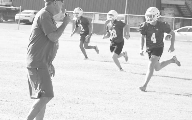 SPC CAMP- Midland Christian Head Football Coach Chris Cunningham put his players through their paces Tuesday in the final workout of the Mustangs’ annual football camp at South Plains College. The Mustangs are a Division II school in the (TAPPS) Texas Association of Private and Pariochial Schools. (Photo Courtesy of Jay Kelley)