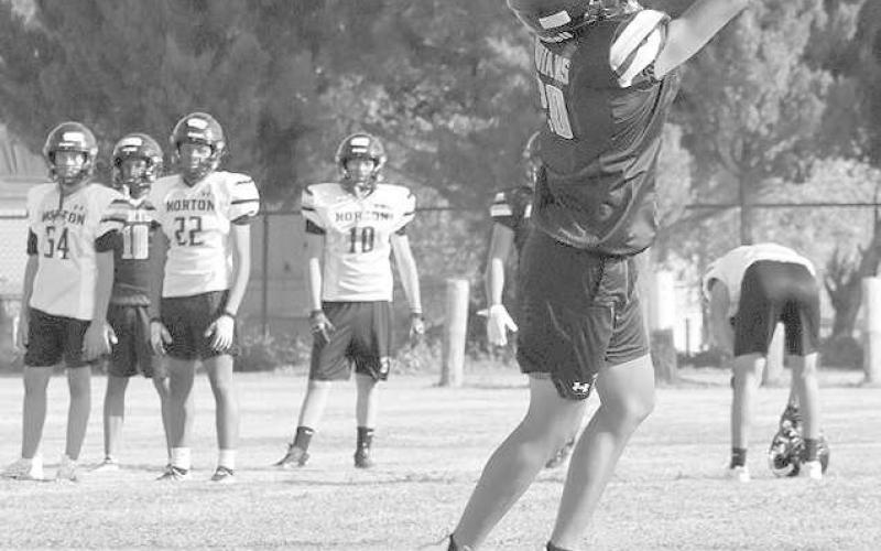 SPECTACULAR CATCH - Morton wide receiver Andres Bejarano went up for the ball during skill drills to make the good effort play. (Staff photo by Aalijah Soliz)