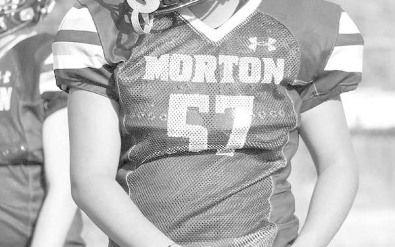 BREATHER - Morton athlete Jorge Regalado was catching his breathe during Morton ISD two-a-day practices in the evening. (Staff photo by Aalijah Soliz)