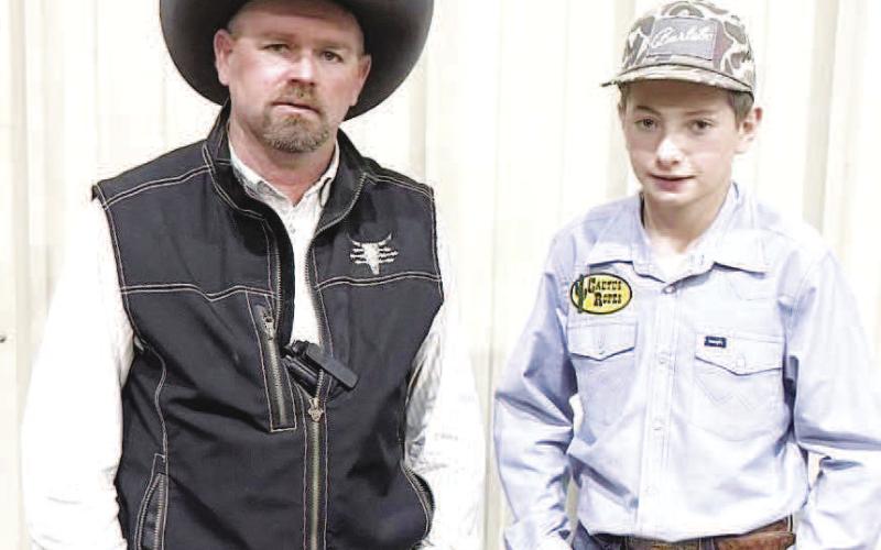ORIGINALTEAM ROPINGAT THE MALLET EVENT CENTER – Taos Lynam and Weston Waldon.