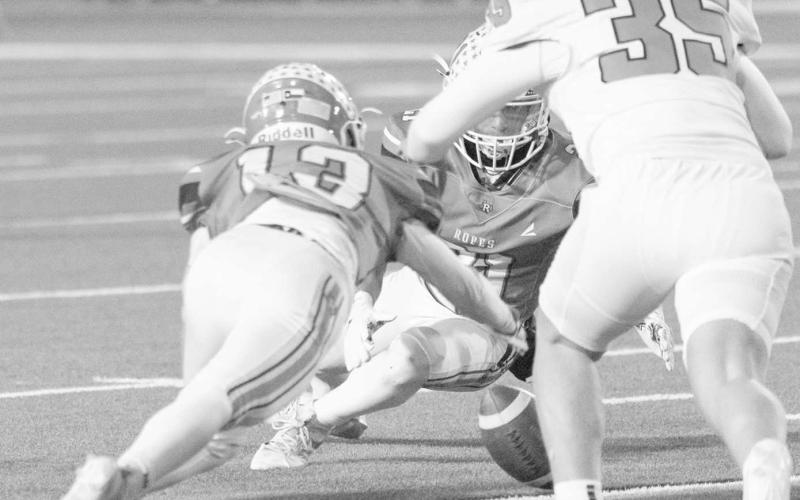 DEFENSE - The Ropes defense was on fire during the team’s last contest Friday with four turnovers on the night. Pictured above are two Eagles jumping on a forced fumble. (Photo courtesy of Donovan Martin)