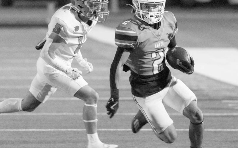 TOO SHIFTY - Ropes Eagle Mason Marmolejo outran the Wink defense to tip-toe down the sideline last Friday night in Big Spring. (Photo courtesy of Donovan Martin)