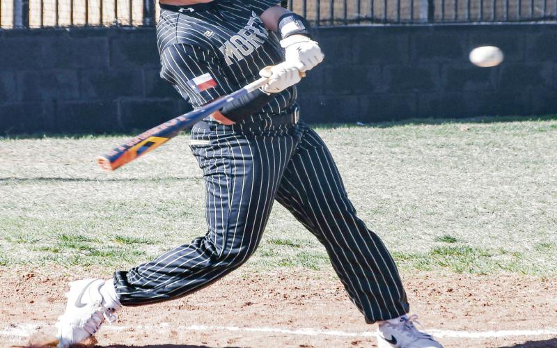 UP &amp;amp; IN SWING - Morton Indian Masyn Enriquez swings at a pitch up and inside during their district baseball game against the Sundown Roughnecks this past Tuesday at Morton High School. (Staff photo by Jentezen Smith)
