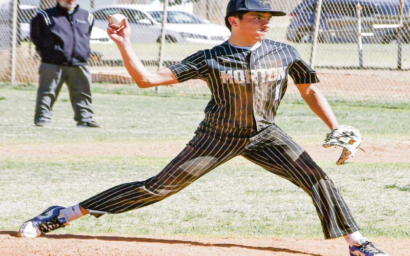 SIDEARM PITCHER - Morton Indian EJ Rivas throws a pitch with his unique sidearm delivery during their district baseball game against the Sundown Roughnecks this past Tuesday at Morton High School. (Staff photo by Jentezen Smith)