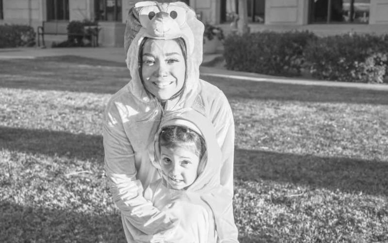 MATCHING COSTUMES – Destiny and Zalyla smiled together in their onesie costumes at Thursday’s Trunk or Treat event in downtown Levelland. (Staff photo by Evin Thomas)
