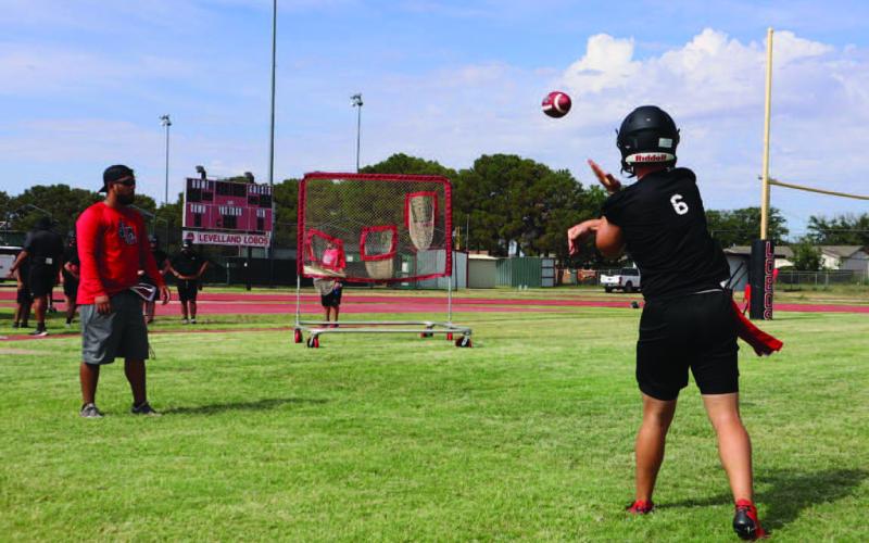 THROWING DRILLS - Levelland QB Rusty Johnson worked on his accuracy and throwing mechanics during Levelland’s two-a-days camp held in the morning before team drills. (Staff photo by Aalijah Soliz)