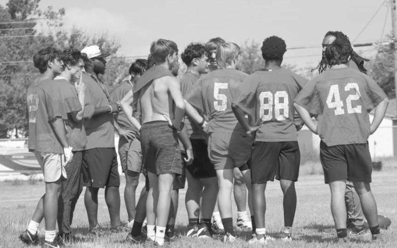 DEFENSIVE GROUP - The Levelland defense group huddled around Levelland Coach Tony Eggleston this past Thursday during team drills to talk over their gameplan. (Staff photo by Aalijah Soliz)