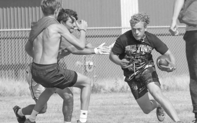 OPEN FIELD - Levelland Lobo Kaden Brogden turned upfield this past Thursday at the Levelland High School during summer workouts. (Staff photo by Aalijah Soliz)