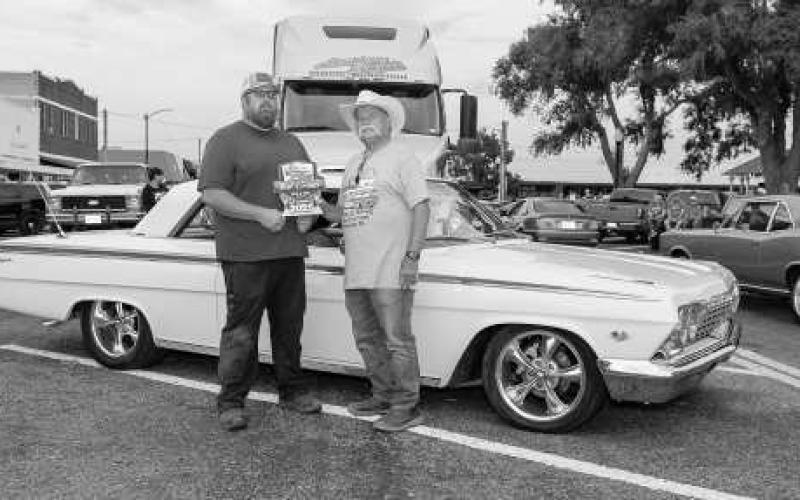 CRUISE WINNER - Pictured is Buddy Holmes after receiving an award during the Thunder on the Plains Cruise. (Photo courtesy of J. Conrad Photography)
