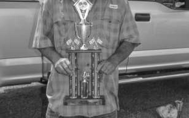 BEST OF SHOW – Shown is Billy Joe Roberts who won Best of Show at the Thunder On the Plains Car Show at the Levelland City Park on Saturday. Roberts won the award with a 1935 Dodge Brothers. (Staff photo by Ada Niederhauser)
