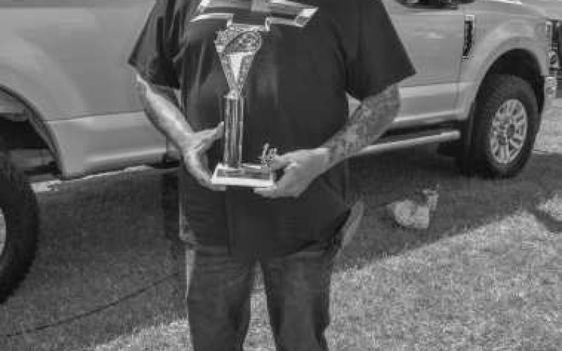 STOCK MOTORCYCLE – Pictured is Jesse Garza who won the Stock Motorcycle Class Award with his 2012 Street Glide at the Thunder On the Plains Car Show at the Levelland City Park. (Staff photo by Ada Niederhauser)