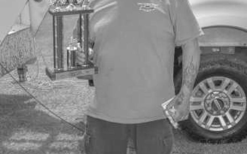 PEOPLE’S CHOICE – Pictured is Raul Orosco, who won the People’s Choice Award at the Thunder On the Plains Car Show. (Staff photo by Ada Niederhauser)