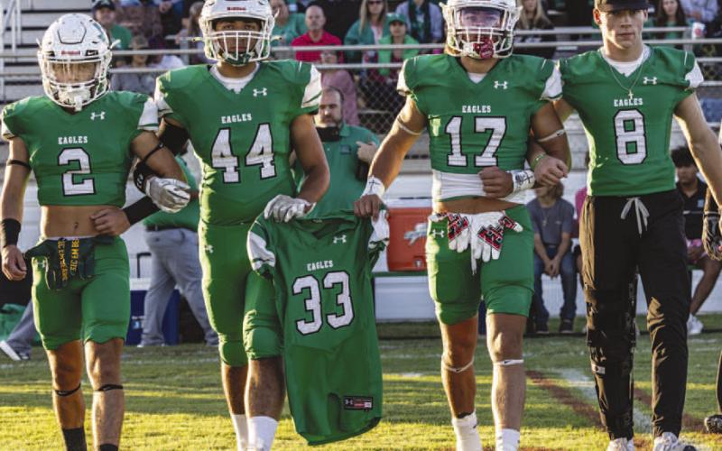 HONORING TUCKER - The Ropes Eagles honored Whitharral Panther Tucker Parkinson who recently passed October 1, by carring his jersey number to the coin toss against the Smyer Bobcats Friday. Teams around the area are honoring Parkinson by carrying his football number during the teams coin toss. (Photo courtesy of Donovan Martin)