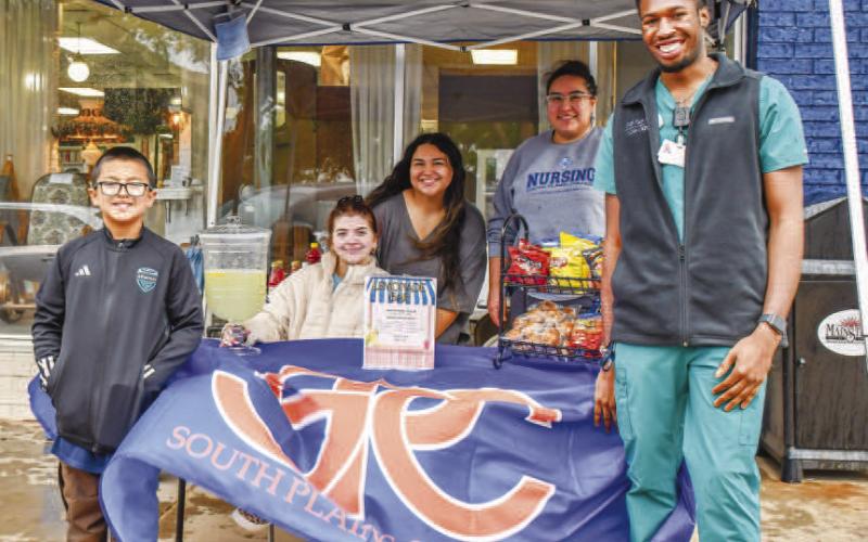 - Pictured from left to right are: Ethan Cante, Saylor Tucker, Daisy Gutierrez, Stephanie Santos and Julius Okpulor of the SPC Nursing Organization who won Best Lemonade during Main Streets Lemonade Day. (Staff photo by Hannah Woodrum)