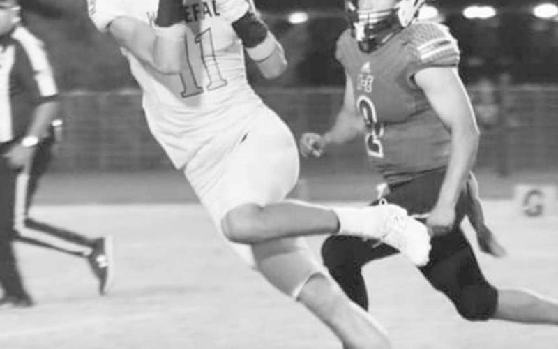 SECURE CATCH - Cesar Chavez had a big catch for the Whiteface Antelopes in a 60-12 road win over the Springlake-Earth Wolverines in UIL six-man high school football action last Friday. The Antelopes are off this week and will start district play next week when Wellman-Union comes to town for a 7:30 p.m. game. (Photo by Holly Crutcher)