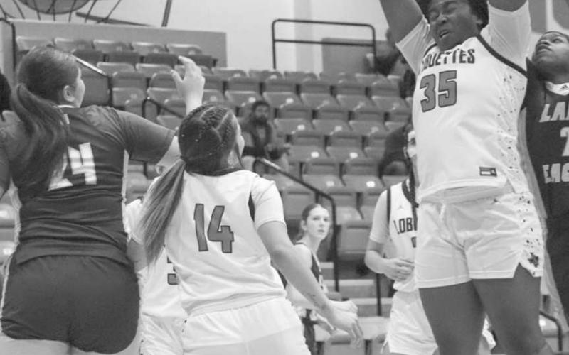 REBOUND - Levelland Loboette Sydnii Joyce ripped down the rebound during the team’s game against Pecos in the Andrews Tournment. (Staff photo by Aalijah Soliz)