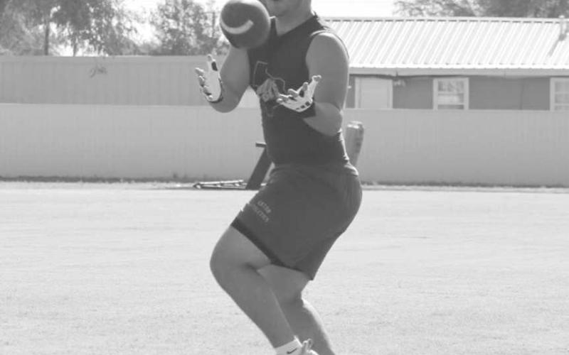 CATCH IN STRIDE - Anton Bulldog Joshua Garcia caught the ball on the run this past Monday during two-a-days practice at the Bulldog Field. (Staff photo by Aalijah Soliz)
