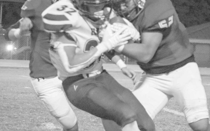 STONEWALLED - Whiteface Antelope Damian Casteneda stopped the Elida ballcarier in his tracks this past Friday during the team’s homecoming game. Whiteface mercy-ruled Elida by the halftime break. (Staff photo by Aalijah Soliz)