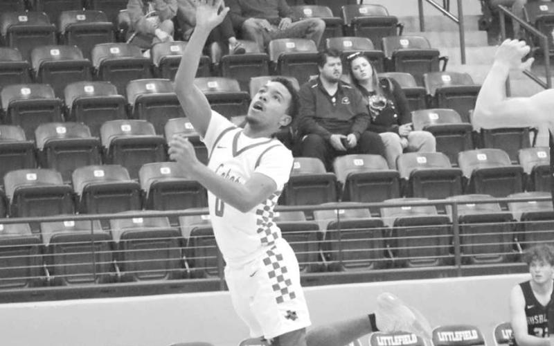 ATHLETIC FINISH - Levelland Lobo Jayden Castillo layed the ball up during the teams contest against the Bushland Falcons during the Littlefield Tournament last week. (Staff photo by Aalijah Soliz)