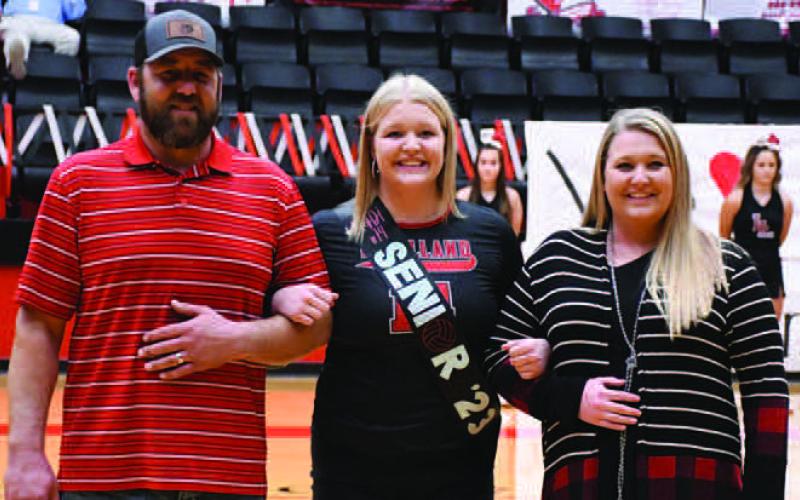 LOBOETTE SENIOR NIGHT- The Levelland Loboette volleyball program honored their seniors in their final home game Tuesday, October 25th. Loboette Madisyn Tidwell was escorted by her parents Marty and Chanda Tidwell. (Staff Photo by Dom Puente)