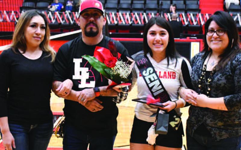 LOBOETTE SENIOR NIGHT- The Levelland Loboette volleyball program honored their seniors in their final home game Tuesday, October 25th. Loboette Kadi Salinas was escorted by her mother Valerie Muniz, father Alex Salinas and stepmother Marivel Marquez. (Staff Photo by Dom Puente)