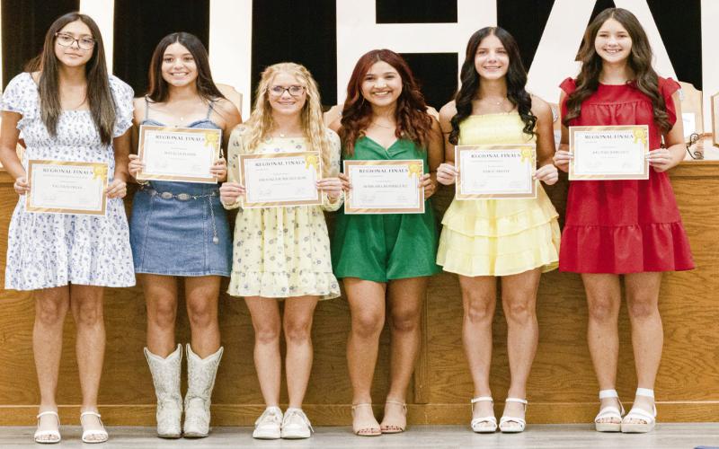 GIRLS TRACK AWARDS - Field Event MVP: Emberly Prowell, Women’s Fast Award: Paige Smith, Red Heart Award: Emma Gonzales, Captain Award: Sheridan Neal and Most Valuable Runner: Kalyn Bates. (Staff photo by Eric Venkatesan)