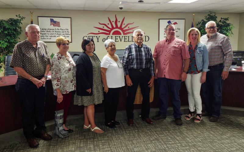WARM WELCOME - The City of Levelland City Council swore in Max Ledesma during the Monday evening meeting at City Hall. Ledesma is representing District B for the City of Levelland and will be serving his fifth term as a council member. Pictured from left to right are: Councilman Jim Myatt, Levelland Mayor Barbra Pinner, Mary Lou Ledesma, Janie Ledesma, Councilman Max Ledesma, Councilman Michael Stueart, Councilwoman Breann Buxkemper and City Manager Brandon Anderson. (Staff Photo by Dom Puente)