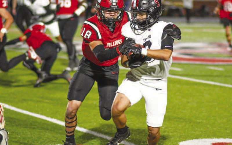 RUNNING WITH BAD INTENTIONS - Ricky Rodriguez has continued to be a workhorse at the running back position for the Lobos. Rodriguez finished the game with multiple runs that went for 15-plus yards that kept the Lobos offense moving down the field. (Staff photo by Dom Puente)