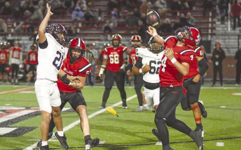 APPLYING PRESSURE - Levelland Lobo Jake Potter found himself tracking down the Borger quarterback during a busted play Friday night. The Lobo defense locked down Borger offensively as their unit only had one scoring drive in the third quarter. (Staff photo by Dom Puente)