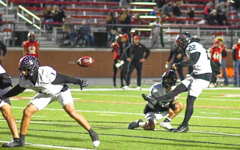 PAT MACHINE - Lobo Eli Randol finished the game 2-for-2 on PAT’s against the Borger Bulldogs. Every point mattered in the nailbiting win against the Bulldogs. The Lobos will be fighting for a playoff spot on Friday as they host the Liberty Patriots at 7 p.m. The kicking efforts of Randol will be relied upon in the contest. (Staff photo by Dom Puente)