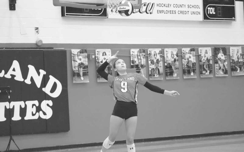 SERVE - Levelland athlete Saydi Mendes served the ball to the opposing team as the girls won distrrict for the second year in a row. (Staff photo by Aalijah Soliz)