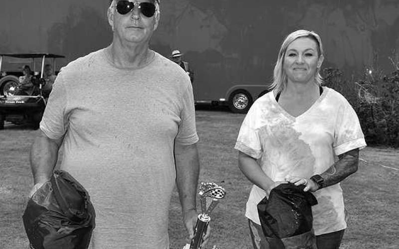 BESTOFTHEBEST– Thunder on the Plains presented many awards for those who were the best of the best in their category. Pictured is James Malone winning Best MOPAR for his 1964 Sport Fury Heather Anderson winning the Best Ford award for her 2020 Mustang at the annual Thunder on the Plains Car Show Saturday in City Park. (Staff Photo)