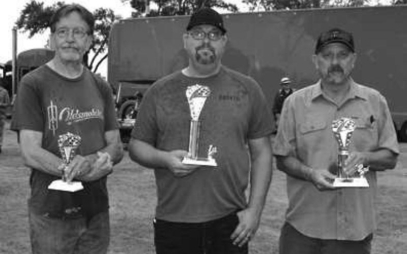 GMMUSCLECARS– GM muscle cars were recognized and awarded at the Thunder on the Plains annual Car Show Saturday. Pictured are the winners of the GM Muscle Cars from 1964 to1981 category: first place winner Calvin Frey, 1967 Chevy Nova; second place, John Agnew, 1968 Chevy Camaro; and third place, Steve White, 1967 Oldsmobile 442. (Staff Photo)