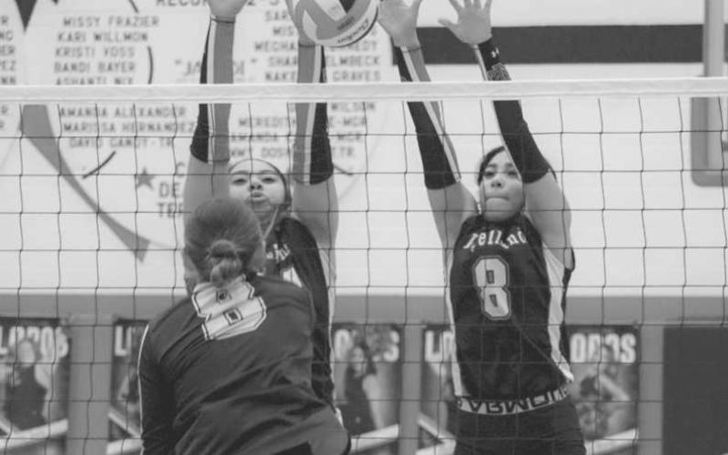 BLOCK PARTY - Levelland Loboettes Trinity Wafer and Mia Sepulbeda jumped up to block the Snyder Lady Tiger shot this past Tuesday at home during Senior Night. (Staff photo by Aalijah Soliz)